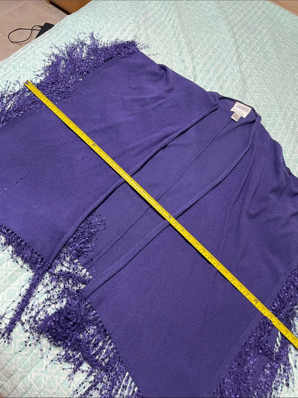 deep purple fringe, scarf, or cape